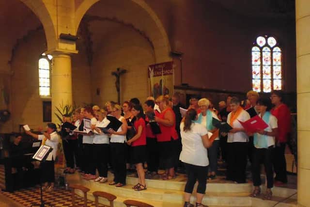 The singers at the service in Bonnetable Church EMN-160509-121436001