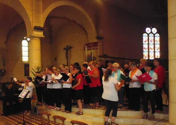 The singers at the service in Bonnetable Church EMN-160509-121436001