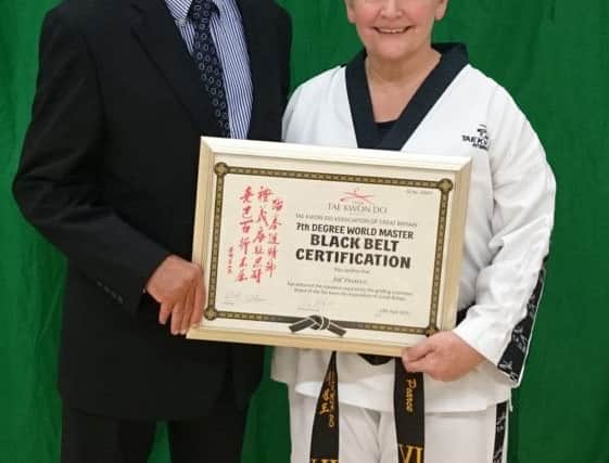 Ninth degree black belt David Oliver with Jill Pearce.