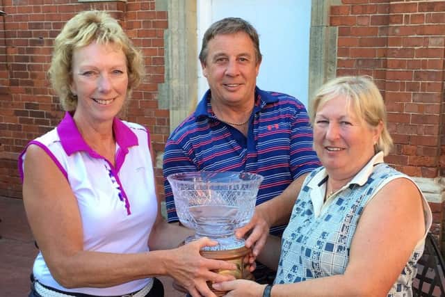 Bank holiday stableford winners Rose Stevenson, Matt Powell and Julie Harvey (right) EMN-160509-175705002