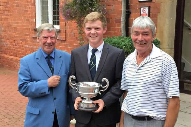 New men's champin Sam Done with Kenwick Park's president Eric Sharp (left) and men's captain Graham Sykes (right) EMN-160509-175653002