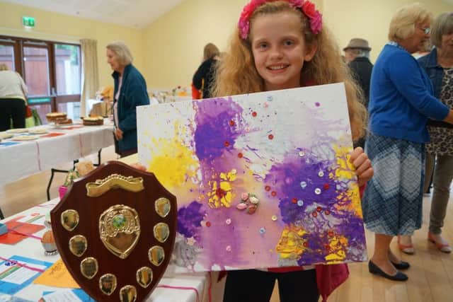 Elicia Terry (10) won the children's 'Best in Show' with her art work EMN-160709-070557001