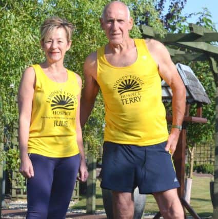 Julie & Terry Cole with 2 year old dog Sammy. They're running the GNR in aid of the hospice EMN-160709-073744001