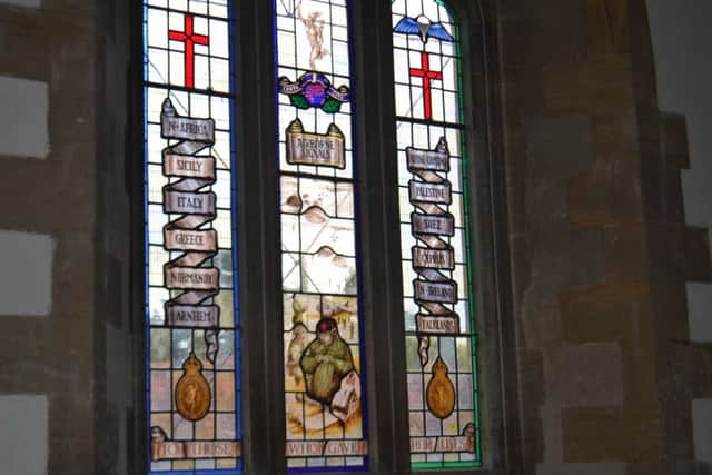 The stained glass window dedicated to the 1st Airborne Signals Regiment in Caythorpe.