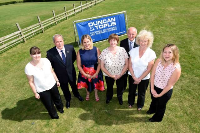 Pictured are (from left) Tracy Foster (Sleaford office - 15 years), managing director Adrian Reynolds, Annette Stewart (Boston office - 15 years), Sandy Jarratt (Boston office - 15 years), director Ian Phillips, Linda Steele (Melton office - 25 years) and Lisa Watson (Newark office - 15 years).