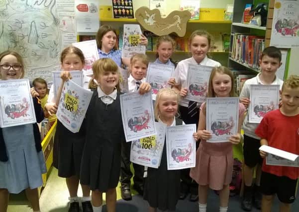 Children with their Summer Reading Challenge certificates at Woodhall Spa Library EMN-160915-162451001