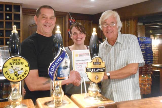 From left, Adam and Victoria Garnade with Paul Croft. EMN-160920-154204001