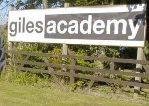 Giles Academy.