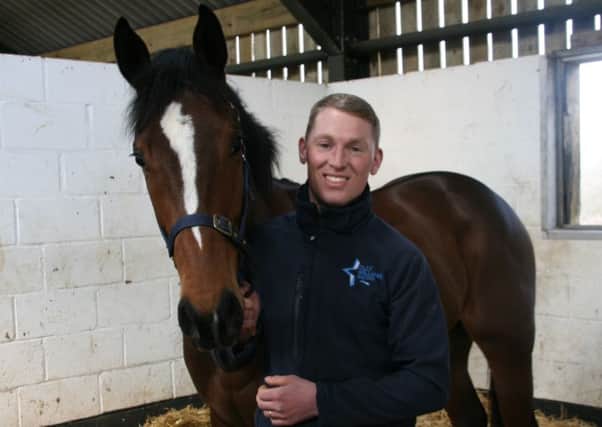 Nettleton trainer Olly Williams with Tricky Dicky EMN-160909-103609002