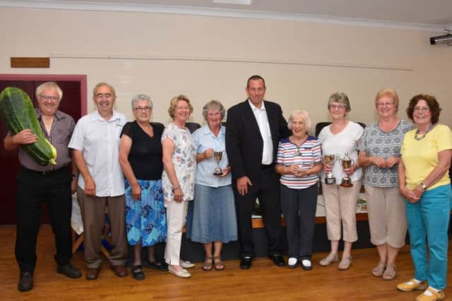 Trophy winners, judges and organisers pictured after the Barkwith & District Gardners Association Late Summer Show
Photo John Edwards. EMN-160909-110759001