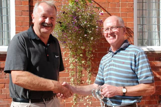 Seniors' captain Roger Culpin (left) with Cunnington Cup winner George Vernon EMN-160909-122559002