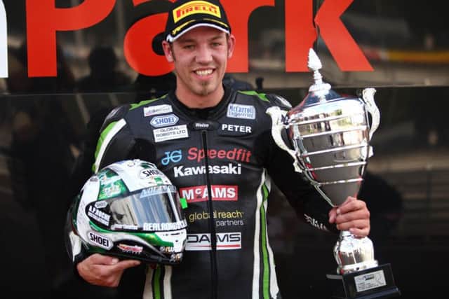Peter Hickman on the podium at Oulton Park. Photo: Dave Yeomans