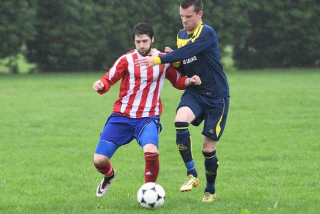 Old Leake's Adam Tempest battles with Bert Snaith.