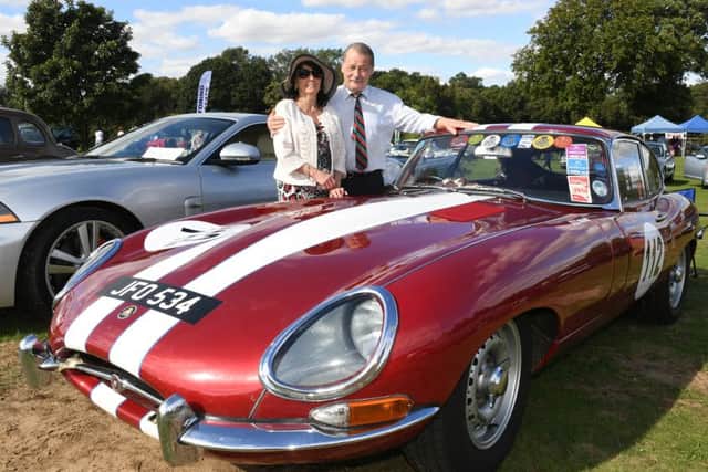 Jaguar Enthusiasts Club classic car show at Woodland Waters. Malvin Ward and Christobel Christopher of Ruskington, with their 1961 Jaguar E Type. EMN-160915-160026001