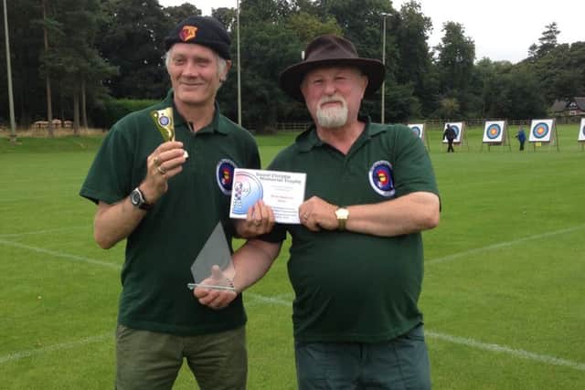 Stuart Rodgers (left) with coach and spotter Rick Smith EMN-160915-142925002