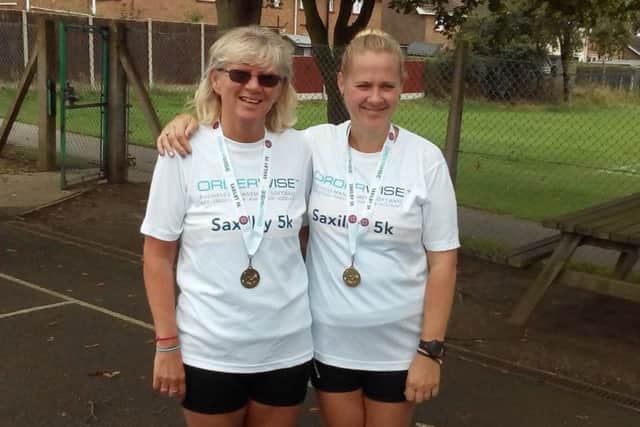Debbie (left) and Andrea recorded personal best times over 5km EMN-160915-145000002
