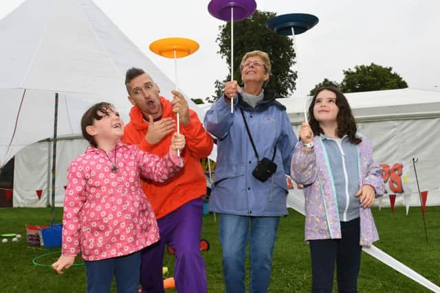 Sleaford and District Round Table Oktoberfest. L-R Isla Massam 7, Karl Robson of Party Workshops, Maureen Proctor, Eliana Massam 8 of Billinghay. EMN-160919-112952001