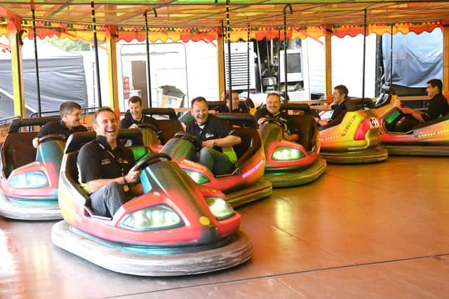 Sleaford and District Round Table Oktoberfest. Tablers on the dodgems. EMN-160919-112925001
