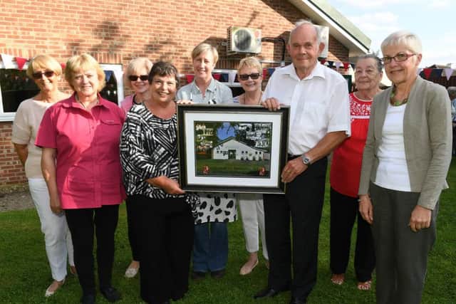 Helpringham village hall celebrating diamond anniversary. L-R Gill Grace, Lindsay Cousland, Tess Taylor, Larraine Wright, Roma Parry, Joyce Drake, Michael Hartley, Teresa Abram, Marian Stocking. Pictured in the new garden area at the back of the village hall. EMN-160919-182832001