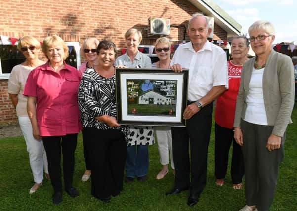 Helpringham  village hall celebrating diamond anniversary. L-R Gill Grace, Lindsay Cousland, Tess Taylor, Larraine Wright, Roma Parry, Joyce Drake, Michael Hartley, Teresa Abram, Marian Stocking. Pictured in the new garden area at the back of the village hall. EMN-160919-182832001