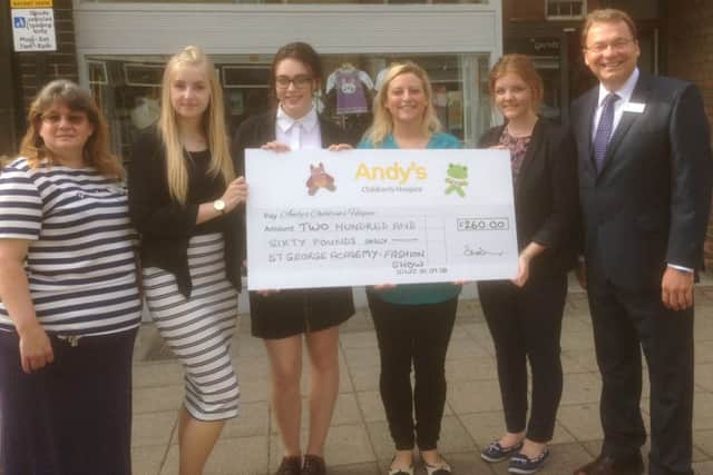 Deborah Homer, Sleaford Andy's shop manager, Kerry Brown, Daisy Hall, ZaZa Warren, hospice representative, Courtney Luther and Principal Wayne Birks EMN-160922-100425001
