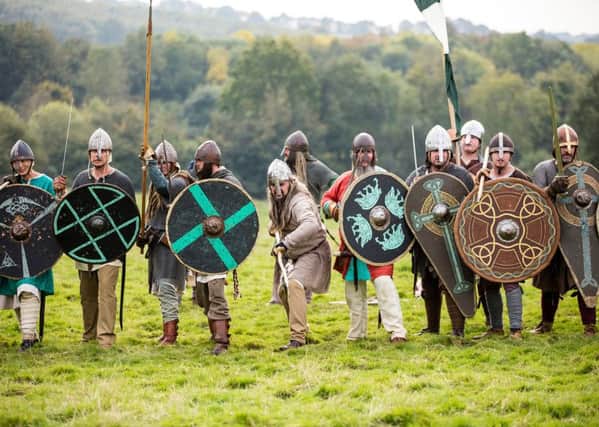 Saxon re-enactors preparing for the Battle of Hastings. This year marks the 950th anniversary of the battle © English Heritage EMN-160920-143657001