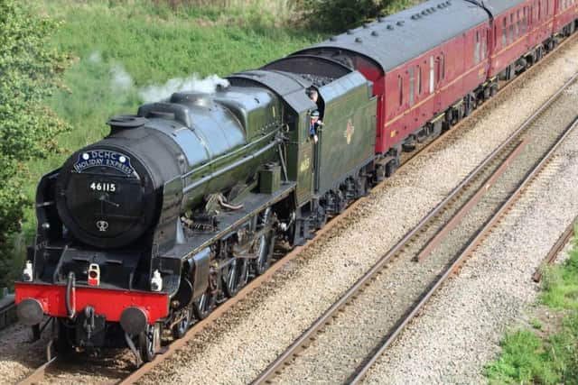 The Scots Guardsman pulling the Derbyshire Children's Holiday Centre anniversary holiday express to Skegness, passing through Sleaford at midday today. Photo courtesy of John Taylor. EMN-160925-161436001