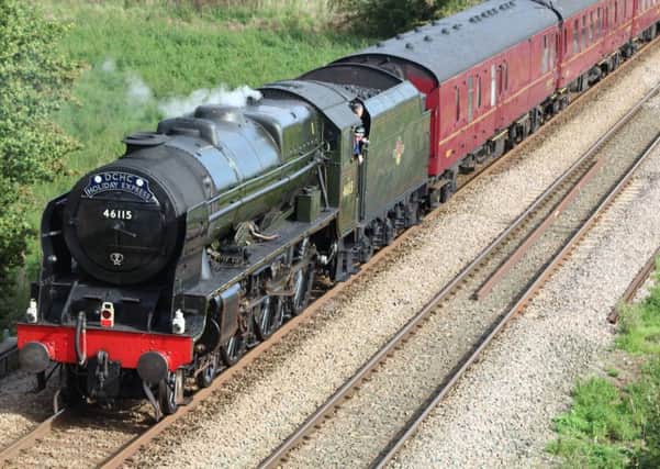 The Scots Guardsman pulling the Derbyshire Children's Holiday Centre anniversary holiday express to Skegness, passing through Sleaford at midday today. Photo courtesy of John Taylor. EMN-160925-161436001