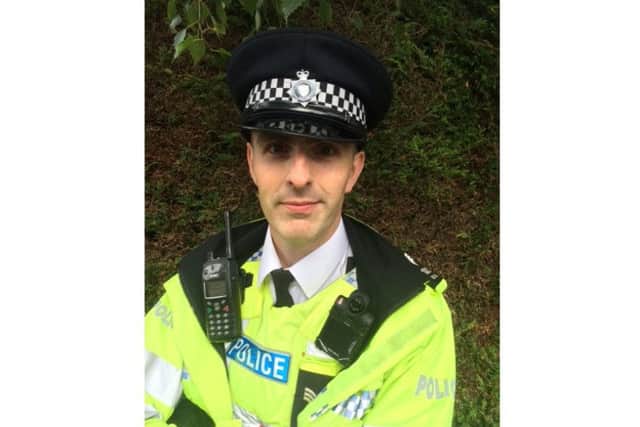Sgt Gareth Boxall, wearing one of the video cameras. EMN-160926-153732001