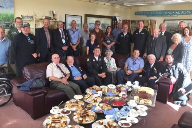 Men and women of WWII ground crew at Battle of Britain Memorial Flight K1uYvldlQOFA2idi5KPS