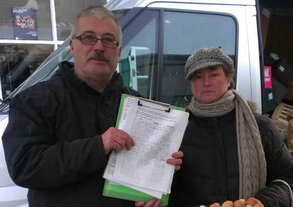 Jennie North and Bryan Spittlehouse with their petition