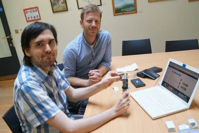 Heritage vilunteer Peter Wheatley and Adam Daubney, Finds Liaison Officer for Lincolnshire EMN-160510-135609001
