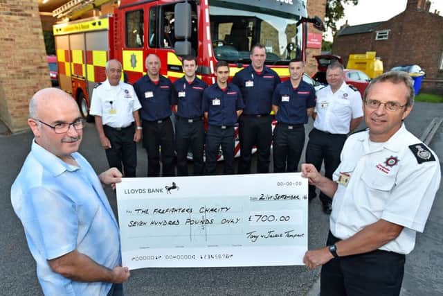 Tony Tempest with Chief Fire Officer for Lincolnshire Fire and Rescue, Nick Borrill.