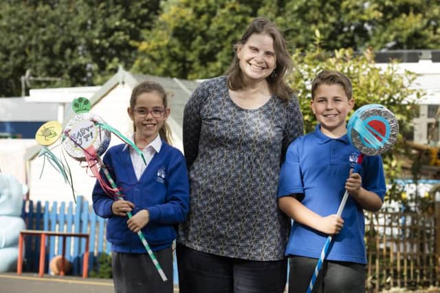 Pupils from one of the Ridges & Furrows creative workshops at Welbourn Church of England Primary School with artist Lyndall Phelps and the artworks they have created. Artworks created by the school children will be on display in St Chads Church on the day of the Horkey. EMN-160410-112855001