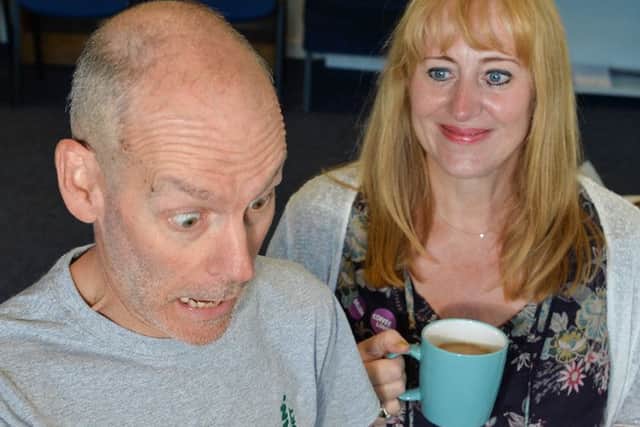 Paul Dickson sees the finshed look after being shaved by Yvonne Potter at the Macmillan Coffee Morning. Photo By:- Laurence Platfoot, RAF Cranwell EMN-160710-174403001