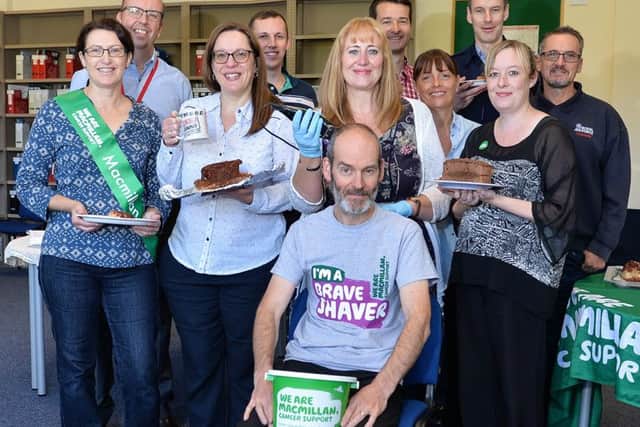 A coffee morning and head shave in support of MacMillan Cancer Support in the Trenchard Hall Library at RAF College Cranwell, when Paul Dickson, who works at RAFC Cranwell, volunteered to have his head shaved in front of onlookers with people pledging money for more to be shaved off by Yvonne Potter. Also pictured are: Catriona Forsyth, Gordon Friar, Roberts, Nicholas Robinson, Andrew Forsyth, Stacey Burley, Linda Allen,Wendey Shippey and Darren Shim. Photo by Laurence Platfoot, RAF Cranwell. EMN-160710-174321001
