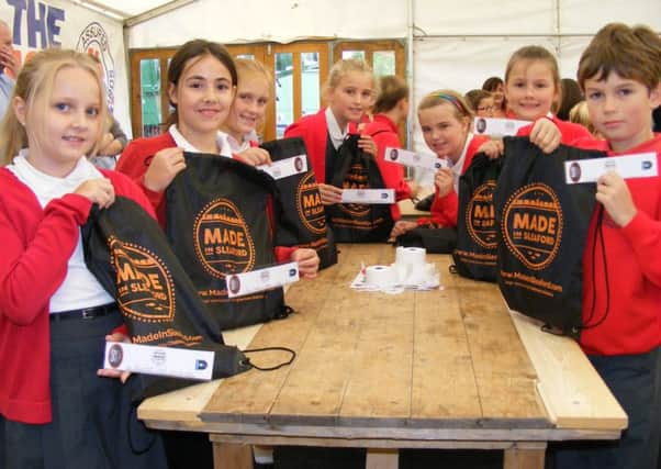 Ruskington Chestnut Street School children show off their Made In Sleaford bags and bookmarks in the Up Science workshop. EMN-160910-145828001