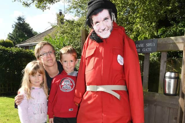 Billinghay Scarecrow Festival. Festival organiser Claire Markham with Archie Markham 5 and erin Markham 4. EMN-160310-135738001