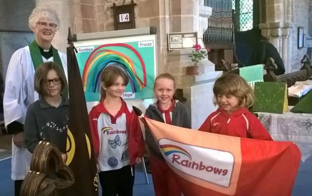Girls from 1st Rainbows and Brownies attended a service at St Mary's Church with Rev Valerie Rampton EMN-160610-140000001