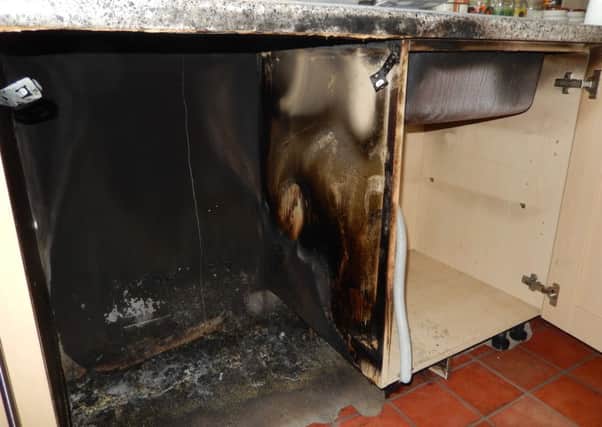 The fire damaged kitchen. EMN-160410-145217001