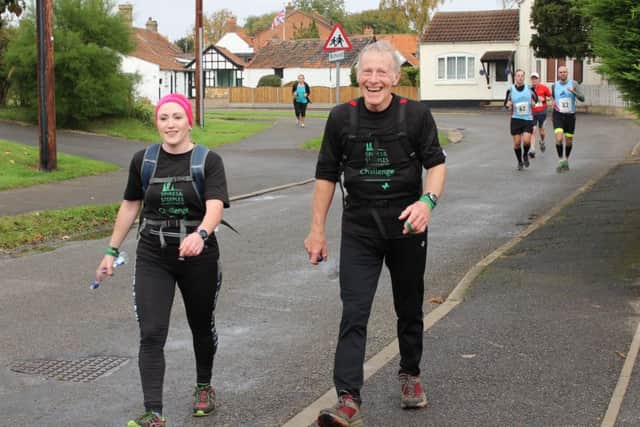 Walkers on the Spires and Steeples Challenge route. EMN-160410-145919001