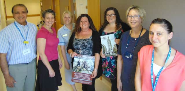 Karen Kingswood (centre) with health care staff and her daughter Billie.