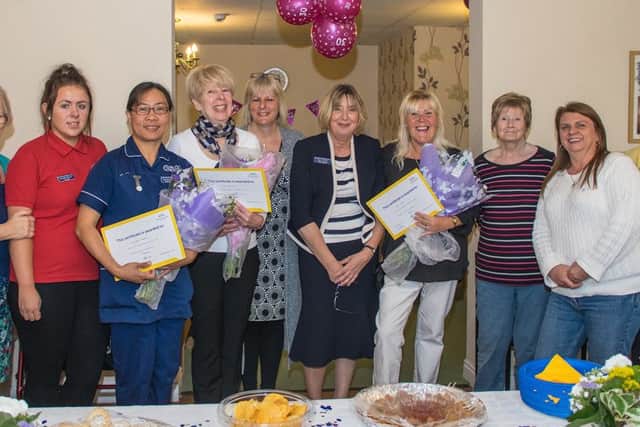 Staff at Doulton Court Care Home in Sutton on Sea celebrating the homes 30th anniversary and a number of long service awards.