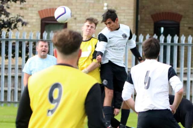 Alex Simpson in action against Wyberton. Photo: Stephen Willmer.