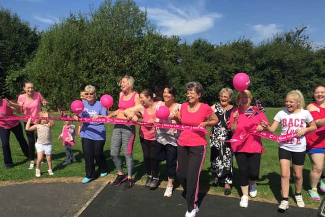 Slimmers take part in the charity event.