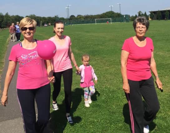 Slimmers take part in the charity event.