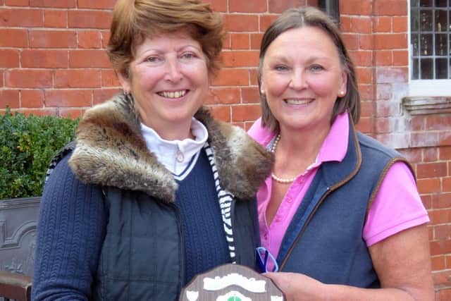 Jo Herring received the Stableford Winners Shield from the lady captain Penny Buckley EMN-161014-091135002