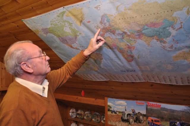 Retired agricultural worker David Hall, 74, has been noting down the trawler names that The Elite Fish and Chip Company in Ruskington display. EMN-161014-110856001
