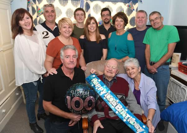 Harry Lloyd of Skegness celebrating his 100th birthday. Pictured with family members Front L-R Richard Lloyd - son, Patricia Foulstone - daughter. Back L-R Catheryn Edwards, Nighel Pettit - grandson, Louisa Perkins - grand daughter, Connor Moore, Jaye Perkins - great grandson, Adam Lloyd - grandson, Andrea Lloyd - daughter-in-law, Neil Pettit - grandson, Ian Foulstone - son-in-law.