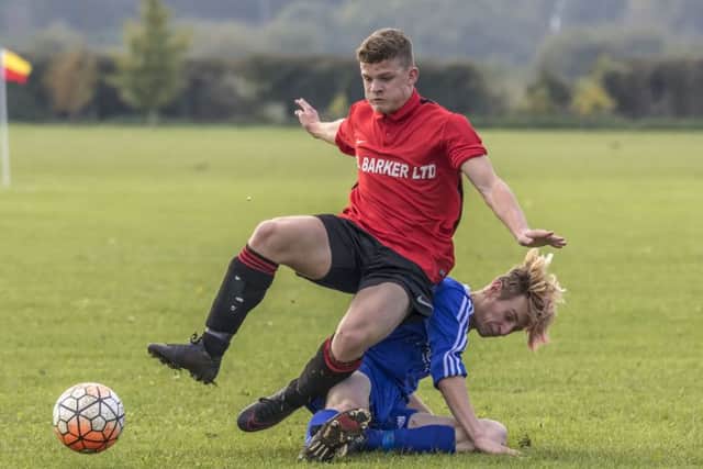 Coningsby Reserves Brendan Rylett has a soft landing during Saturdays game. Photo: Oscarpix Imaging